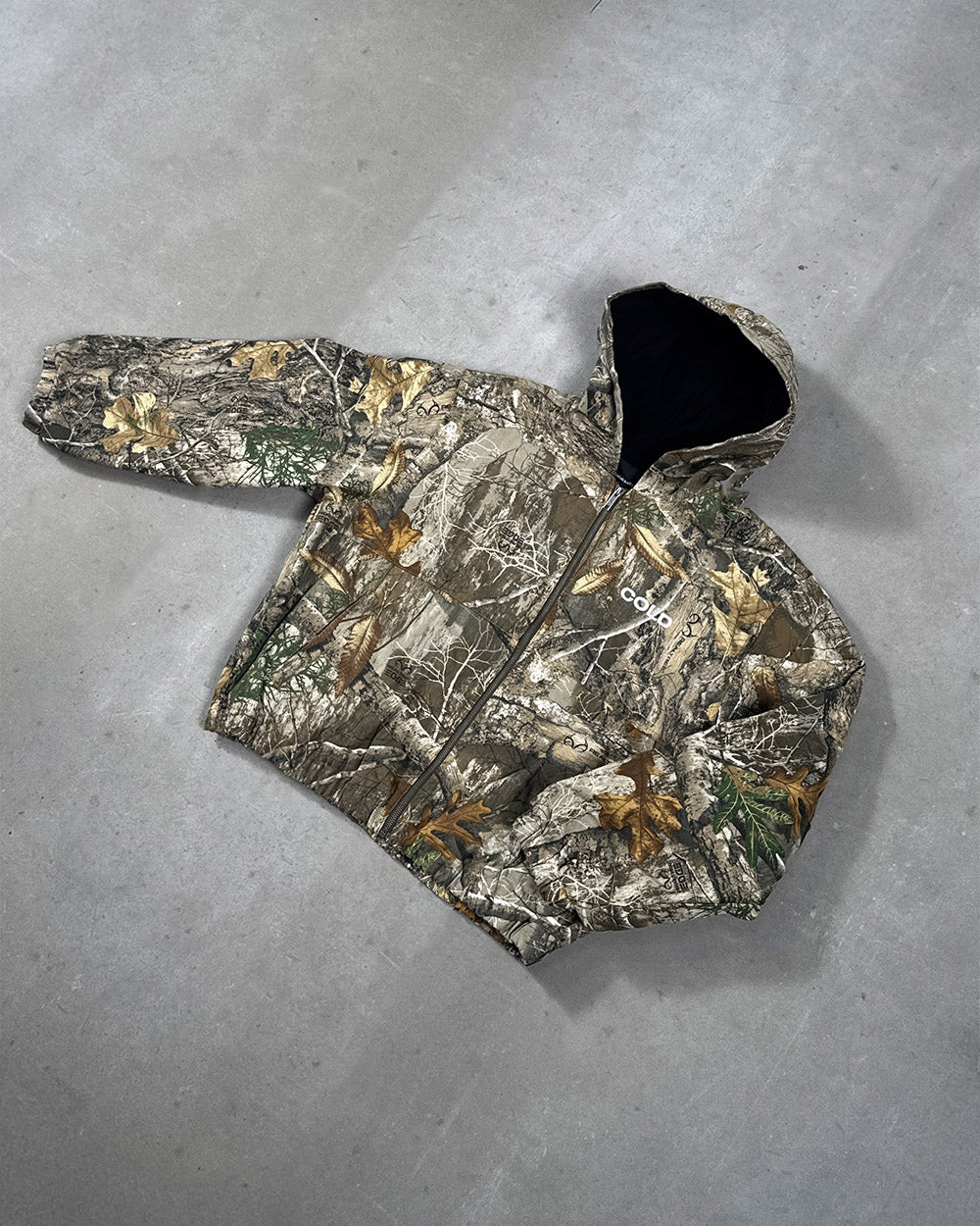 HOODED JACKET REALTREE - realtree camo hooded jacket, flat lay - Cold Culture