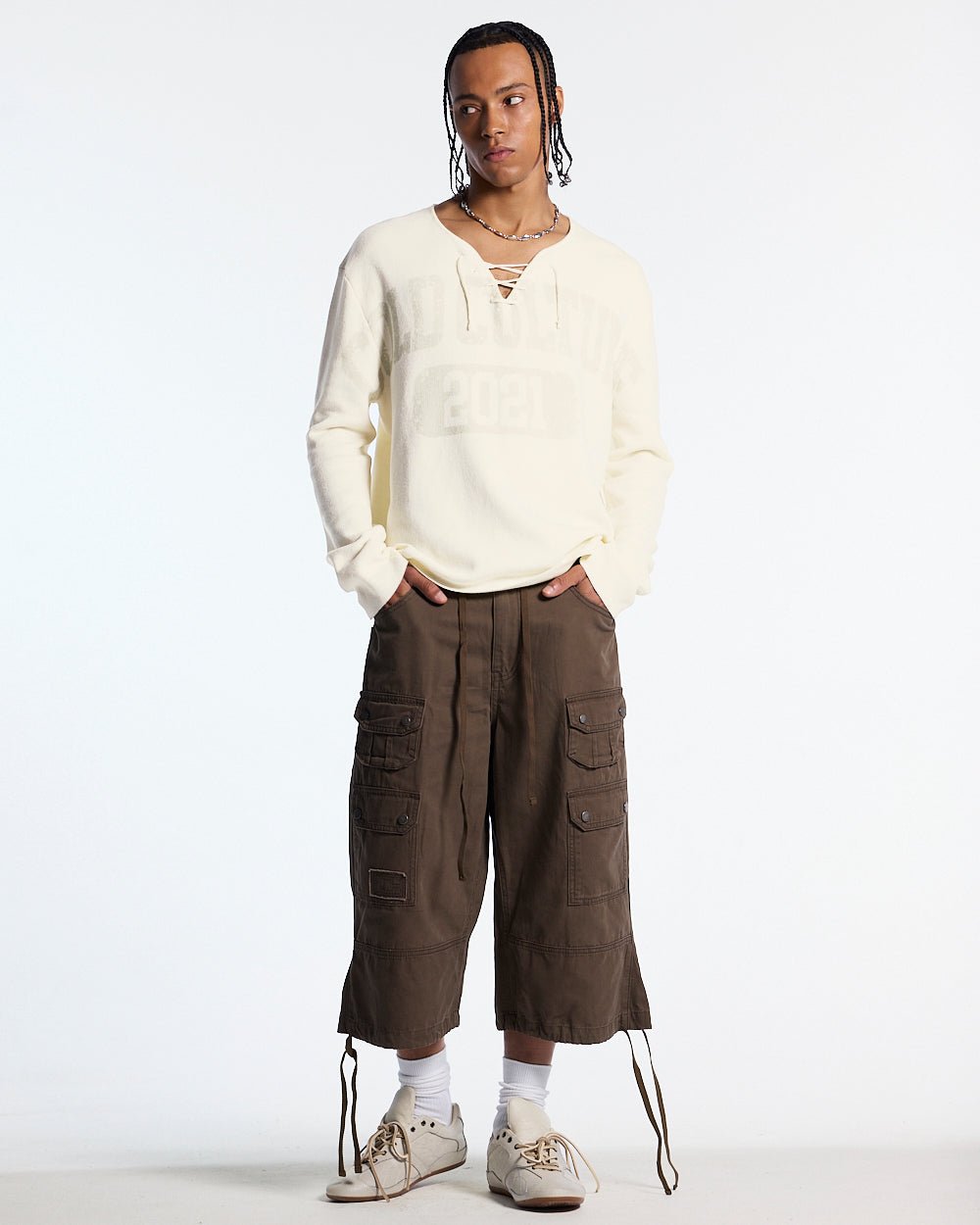 HOOK KNIT BEIGE - beige lace-up knit sweater, front view on male model - Cold Culture #man