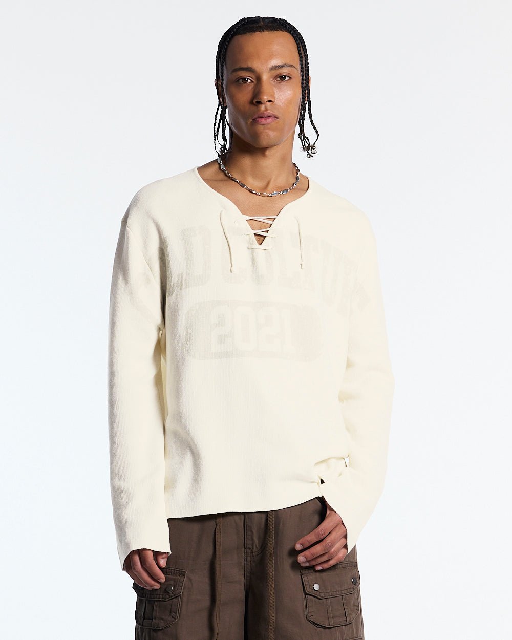 HOOK KNIT BEIGE - beige lace-up knit sweater, front view on male model - Cold Culture #man