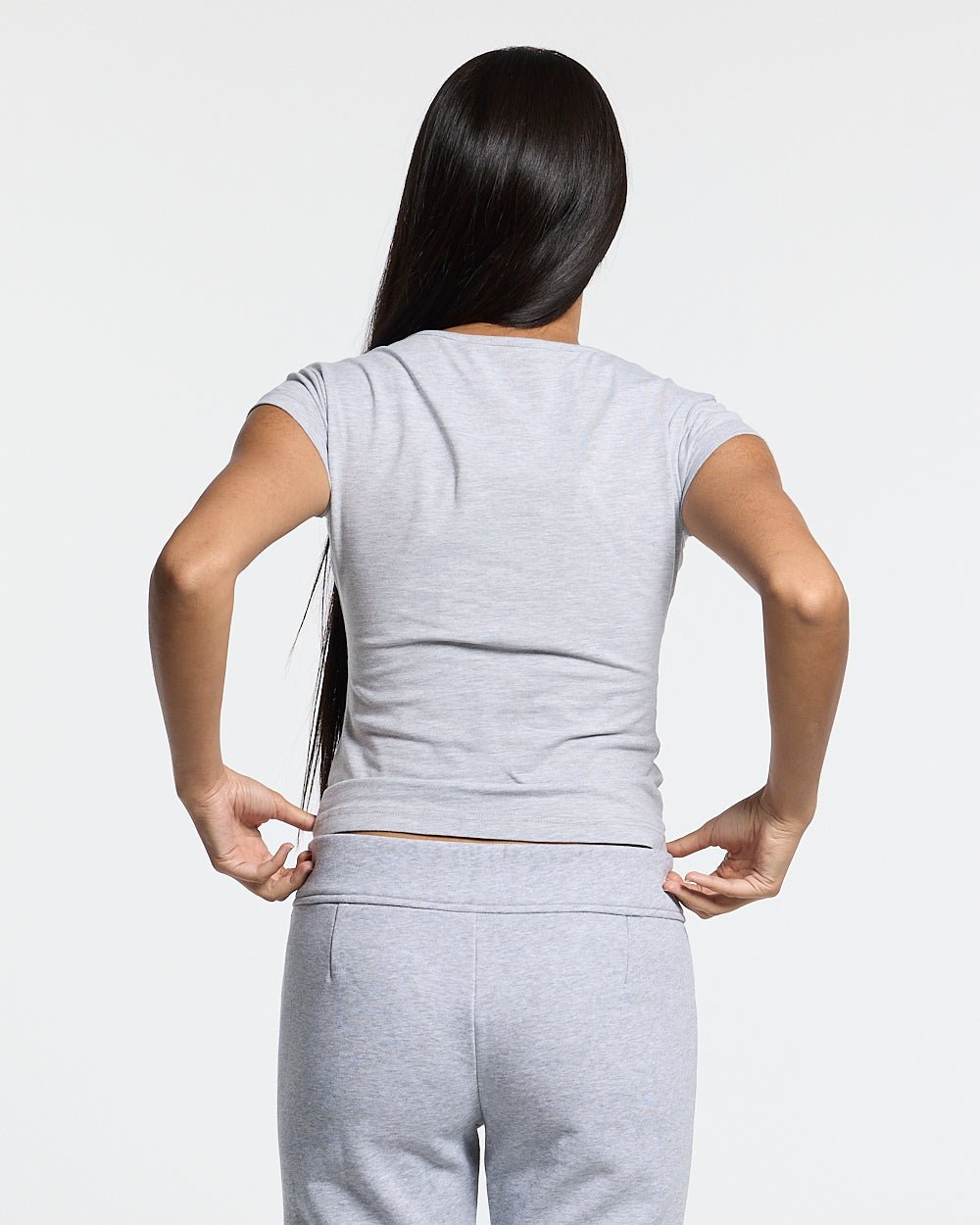 ICON BABY TEE HEATHER GREY - heather grey graphic print women's tee, back view on female model - Cold Culture #woman