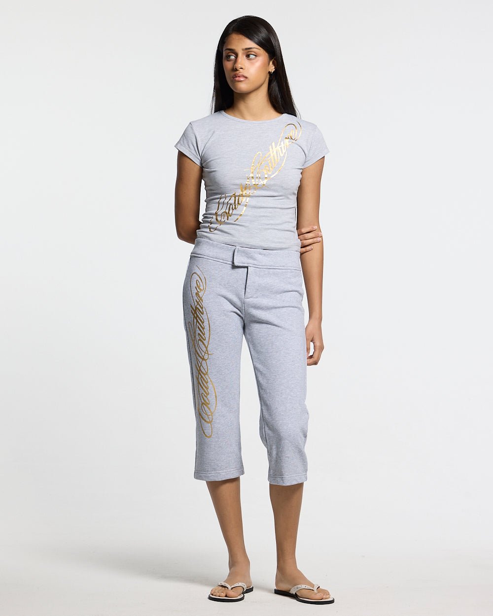 ICON BABY TEE HEATHER GREY - heather grey graphic print women's tee, front view on female model - Cold Culture #woman