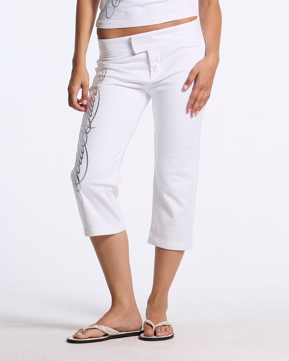 ICON CAPRI WHITE - white cropped women's pants, front view on female model - Cold Culture #woman