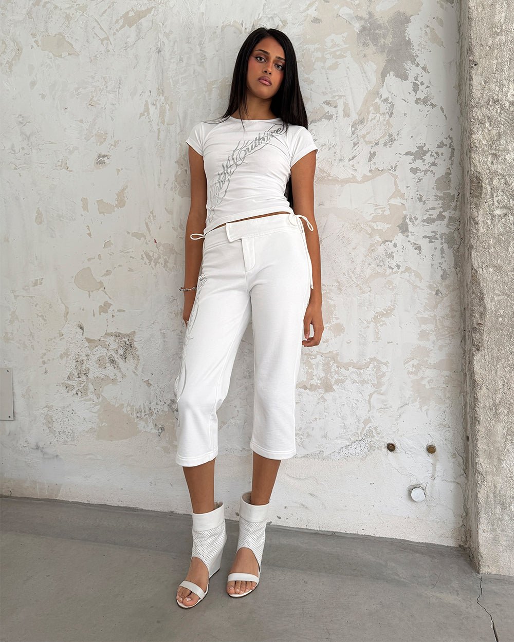 ICON CAPRI WHITE - white cropped women's pants, front view on female model - Cold Culture #woman