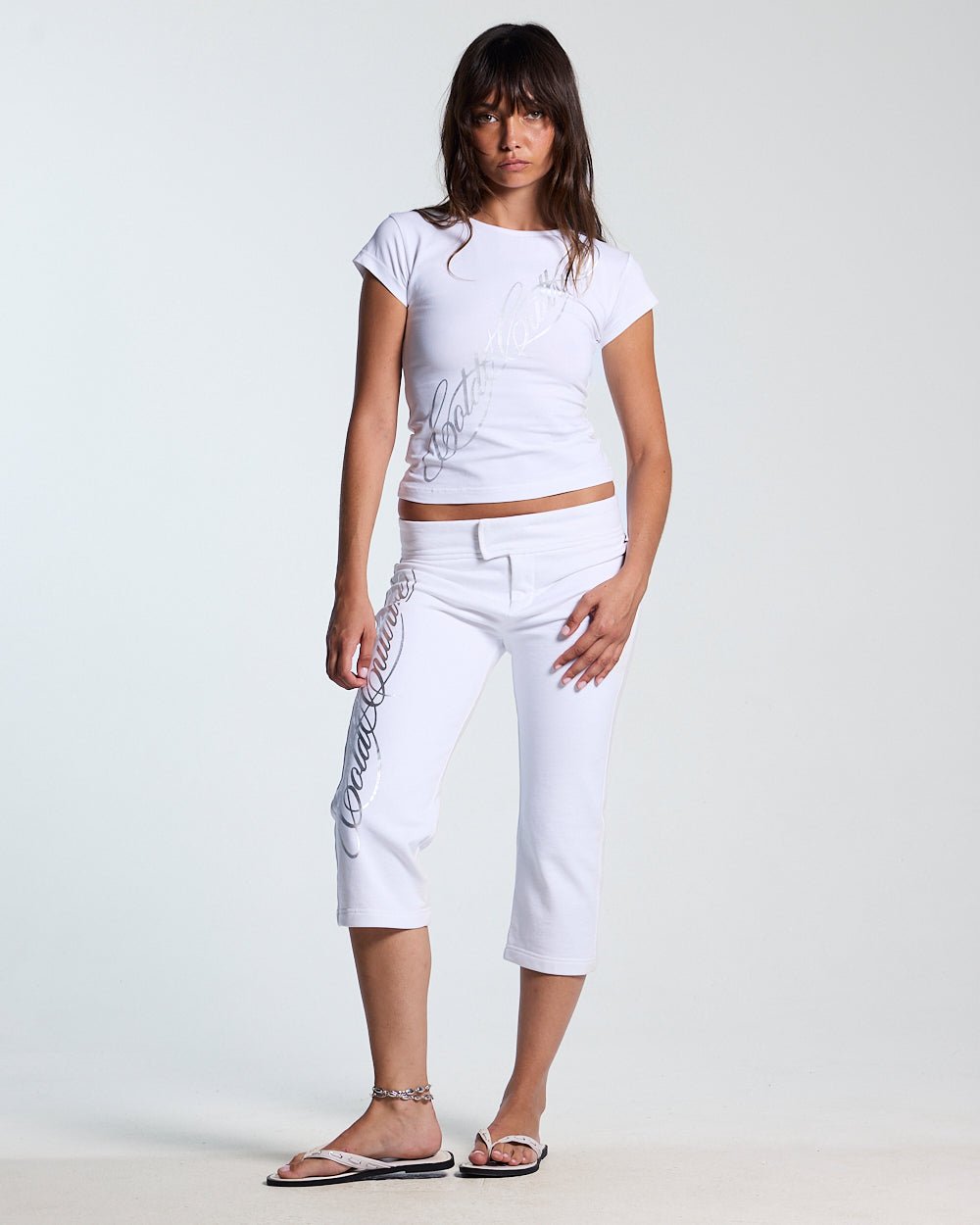 ICON CAPRI WHITE - white cropped women's pants, front view on female model - Cold Culture #woman