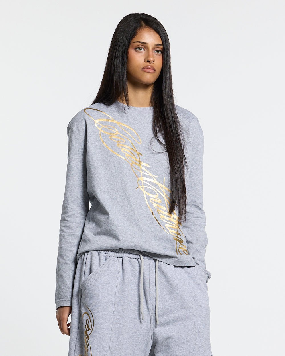 ICON LONGSLEEVE TEE HEATHER GREY - heather grey graphic print longsleeve tee, front view on female model - Cold Culture #woman