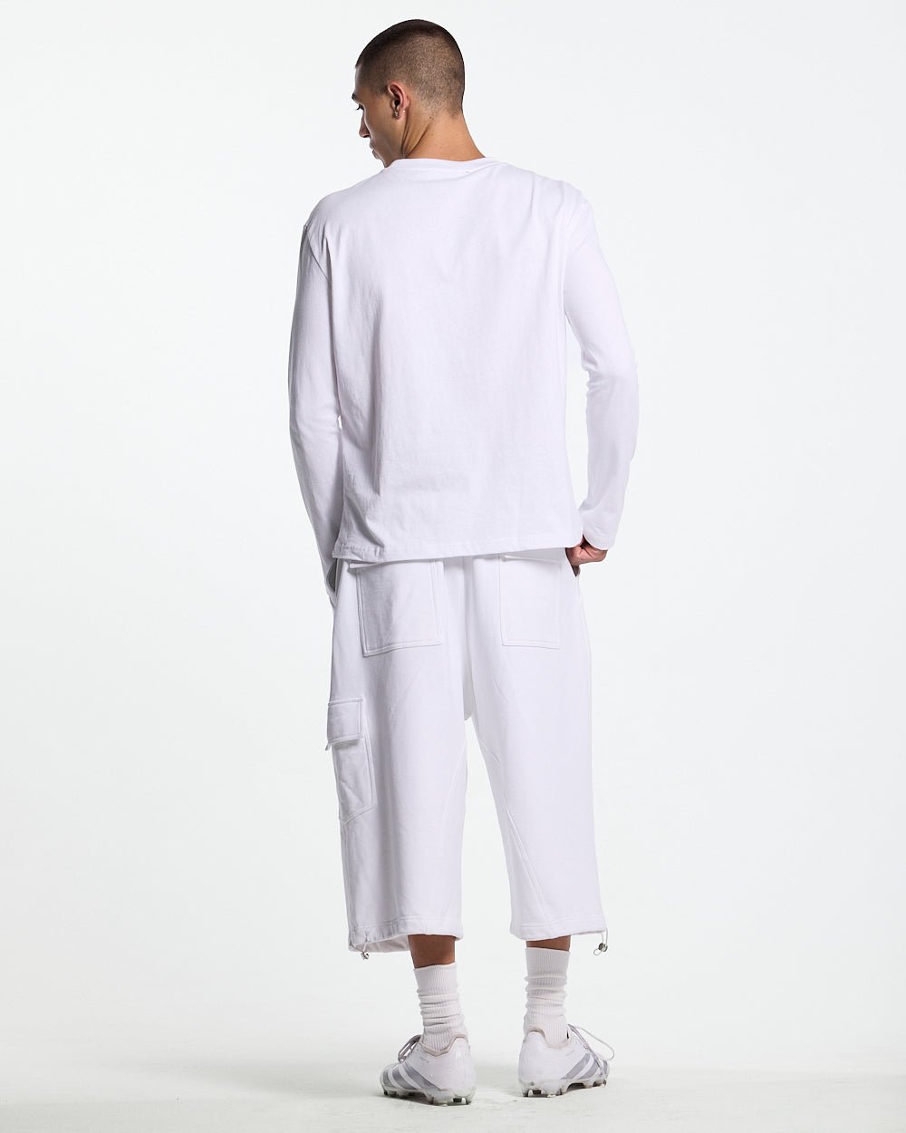 ICON LONGSLEEVE TEE WHITE - white graphic print longsleeve tee, back view on male model - Cold Culture #man