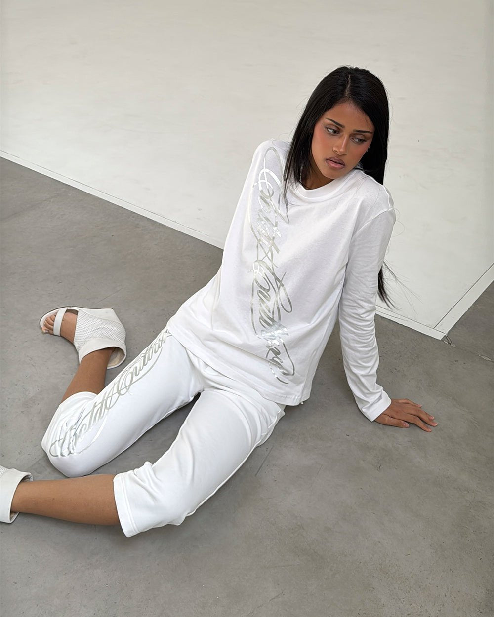 ICON LONGSLEEVE TEE WHITE - white graphic print longsleeve tee, front view on female model - Cold Culture #woman