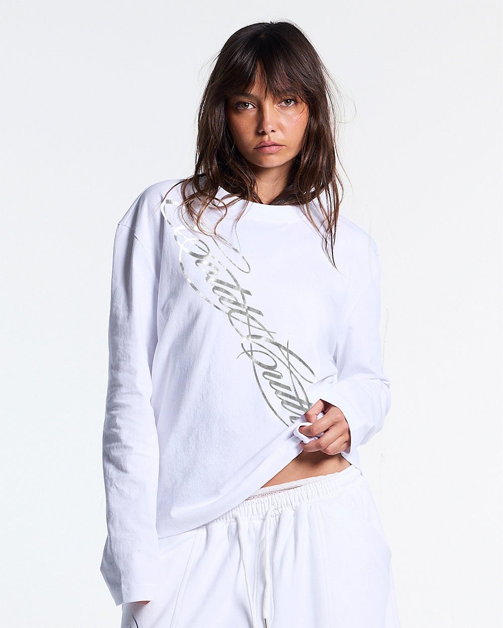 ICON LONGSLEEVE TEE WHITE - white graphic print longsleeve tee, front view on female model - Cold Culture #woman