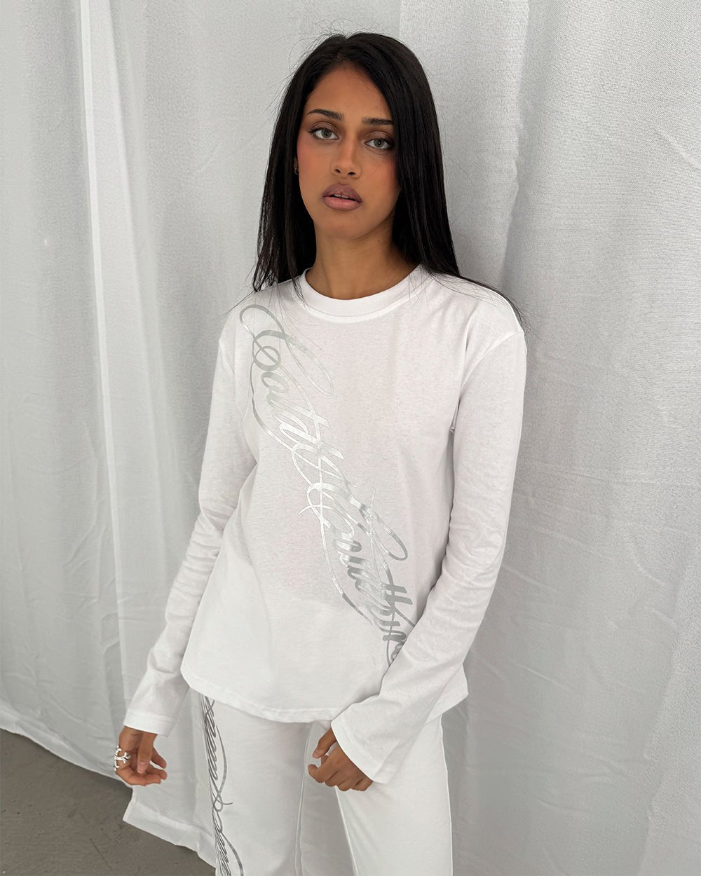 ICON LONGSLEEVE TEE WHITE - white graphic print longsleeve tee, front view on female model - Cold Culture #woman