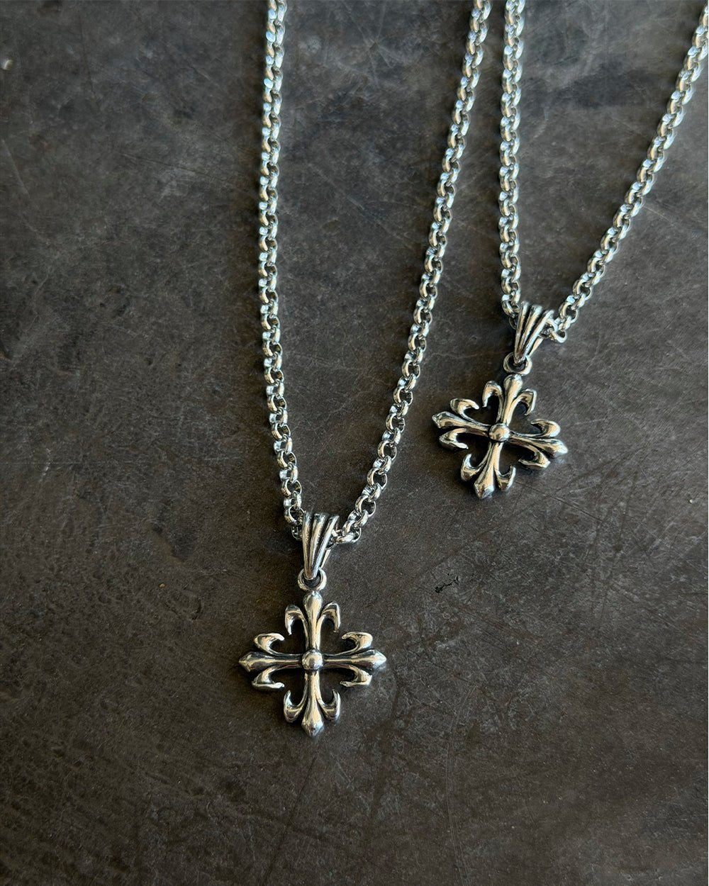 ICON PENDANT SILVER - silver cross pendant necklace, flat lay with matching pieces - Cold Culture