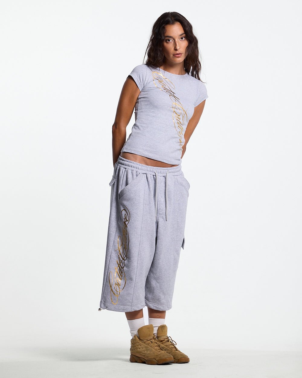 ICON SHORT HEATHER GREY - heather grey baggy shorts, front view on female model - Cold Culture #woman