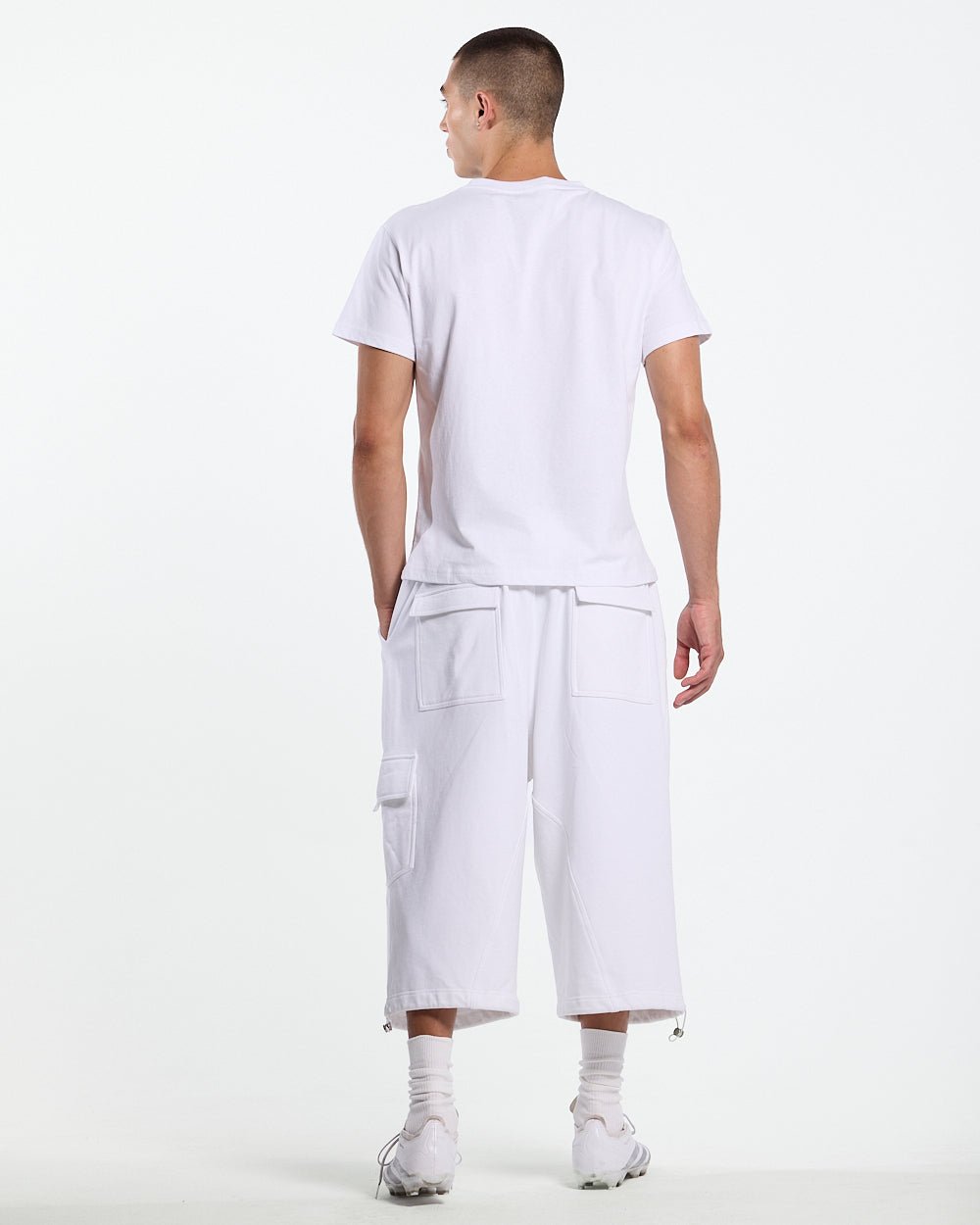 ICON TEE WHITE - white graphic print tee, back view on male model - Cold Culture #man