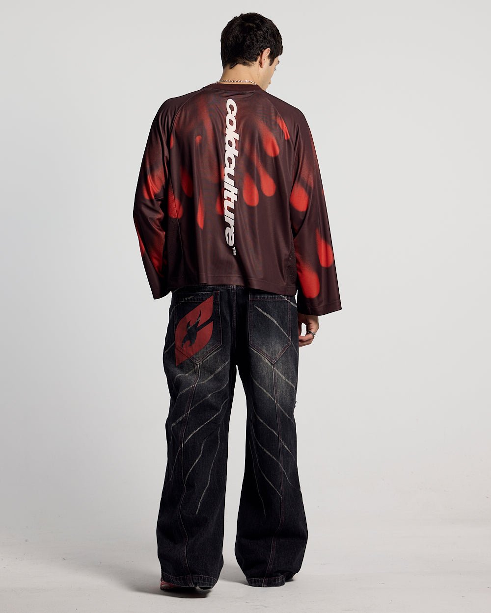IGNITE LONGSLEEVE BLACK & RED - black and red printed longsleeve tee, back view on male model - Cold Culture #man