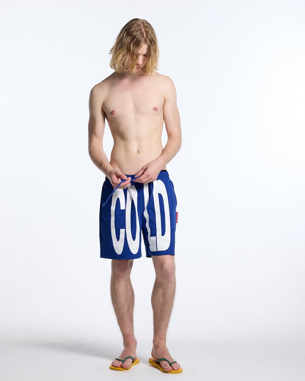 IMPACT SWIMWEAR BLUE - blue printed swim shorts, front view on male model - Cold Culture #man