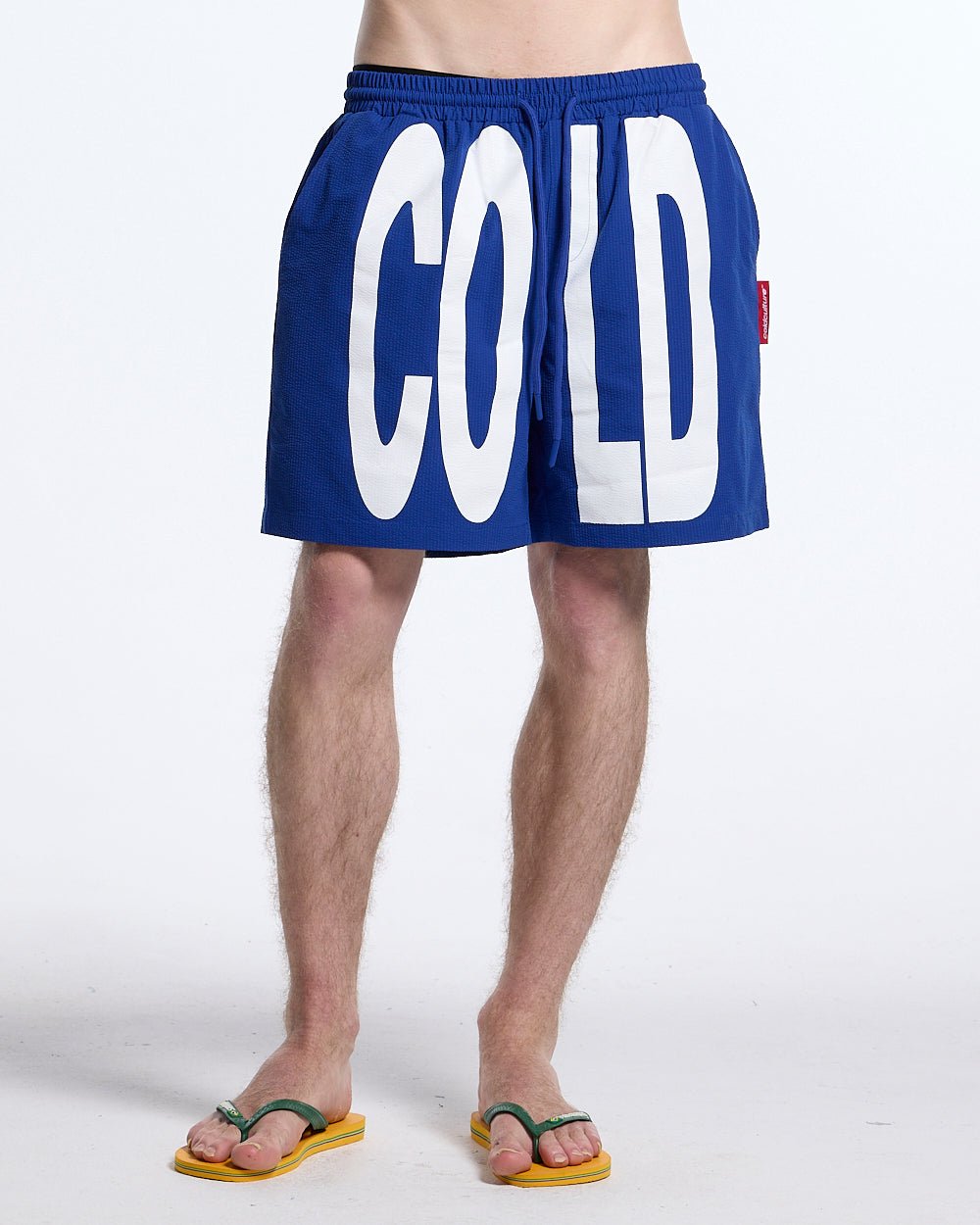 IMPACT SWIMWEAR BLUE - blue printed swim shorts, front view on male model - Cold Culture