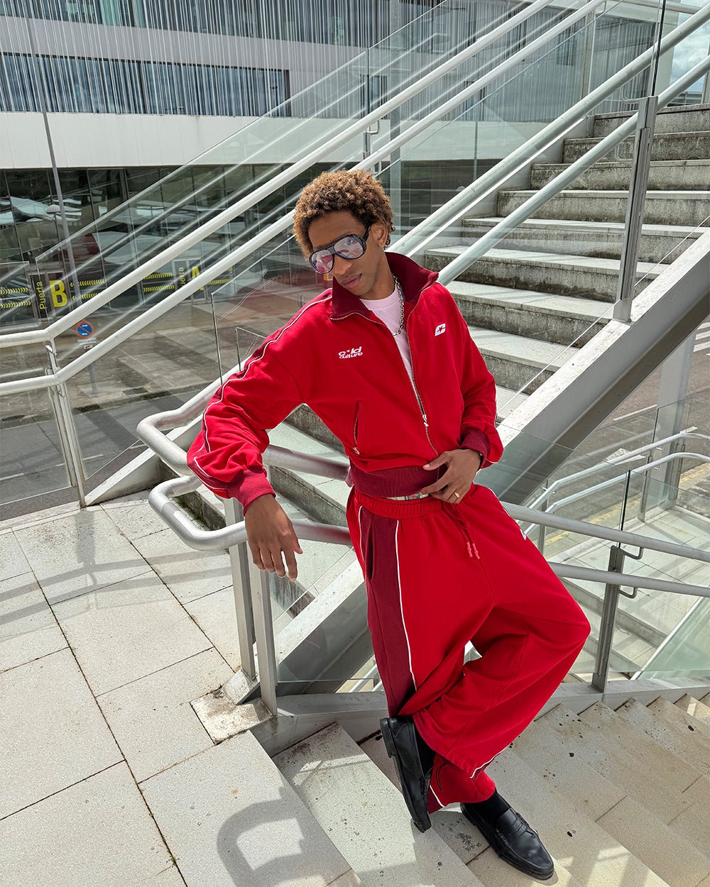 JET LAG JACKET RED - red and burgundy zip-up hoodie, street style shot - Cold Culture