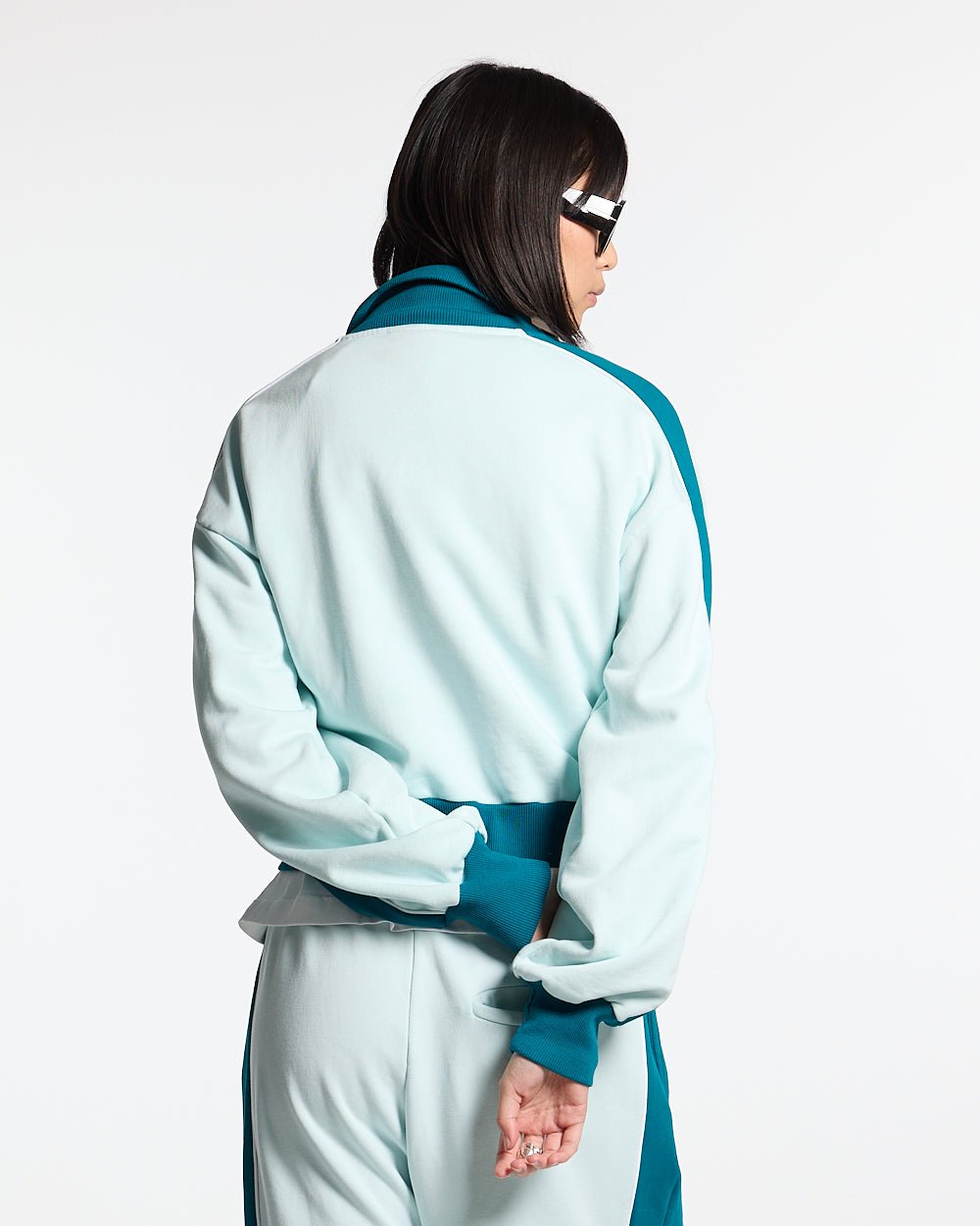 JET LAG JACKET SKY BLUE - sky blue zip-up hoodie, back view on female model - Cold Culture #woman