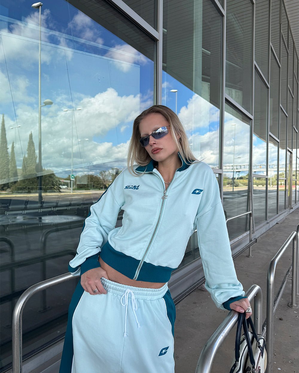 JET LAG JACKET SKY BLUE - sky blue zip-up hoodie, street style shot - Cold Culture #woman