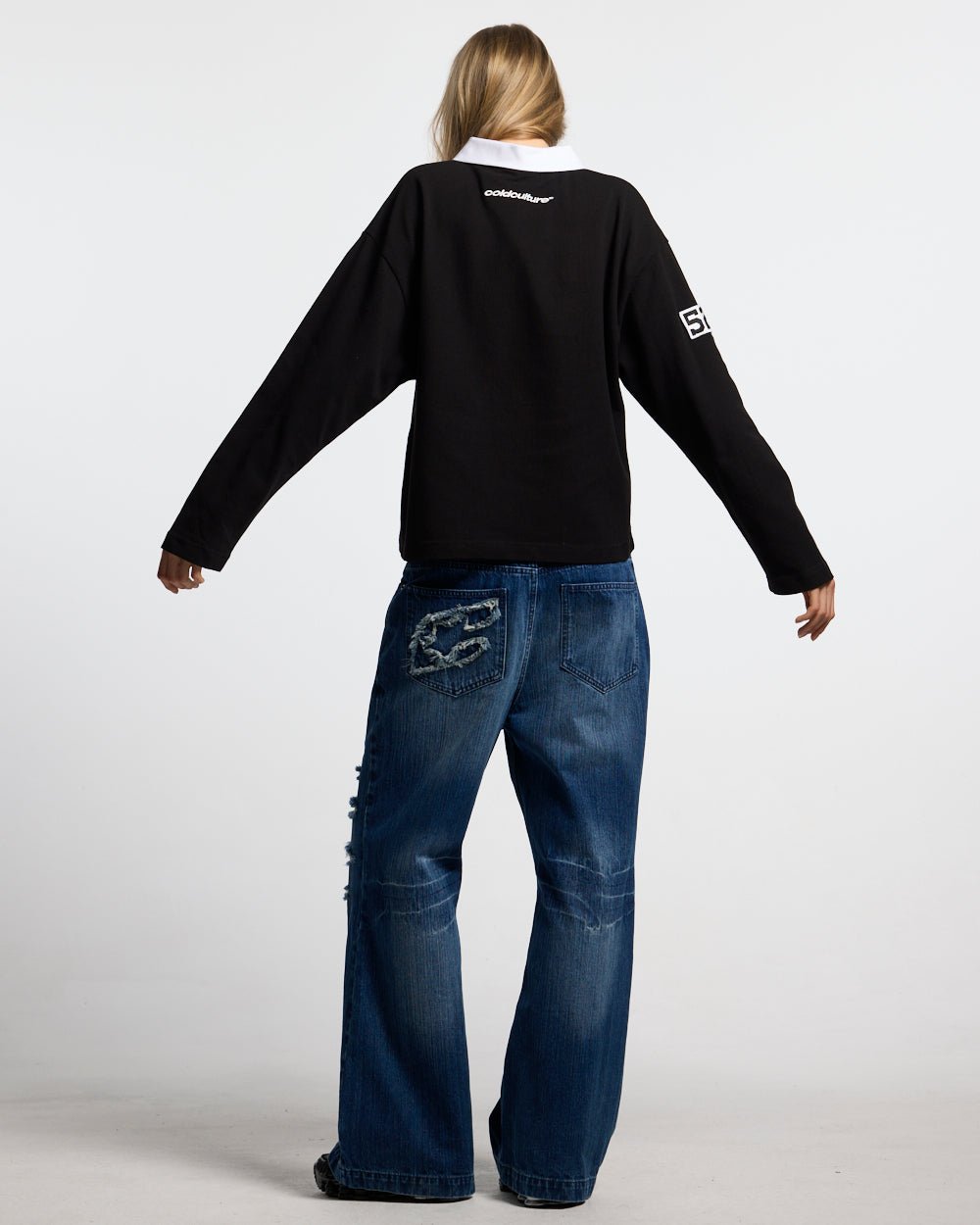 KISS ME POLO BLACK & PINK - black longsleeve polo shirt, back view on female model - Cold Culture #woman