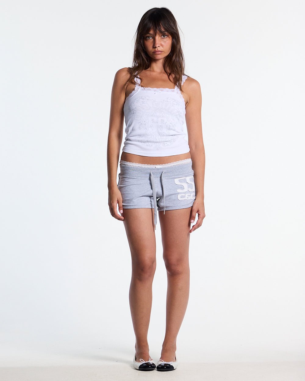 LACE TANK TOP WHITE - white lace trim tank top, front view on female model - Cold Culture #woman