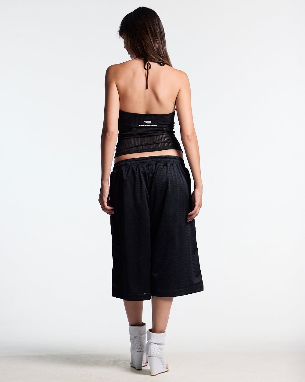 LADY C MESH TOP BLACK - black mesh halter top, back view on female model - Cold Culture #woman