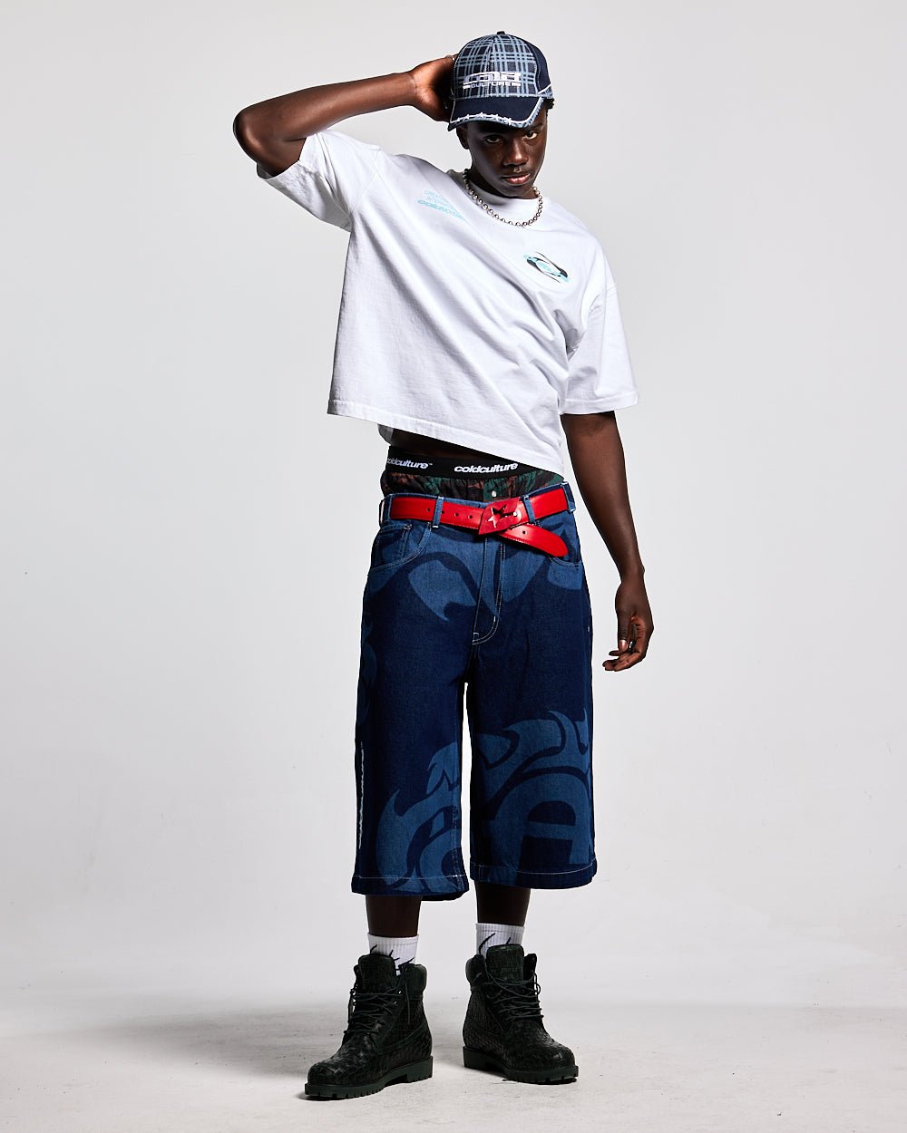 LASER DENIM BLUE JORTS - blue graphic print denim shorts, front view on male model - Cold Culture #man