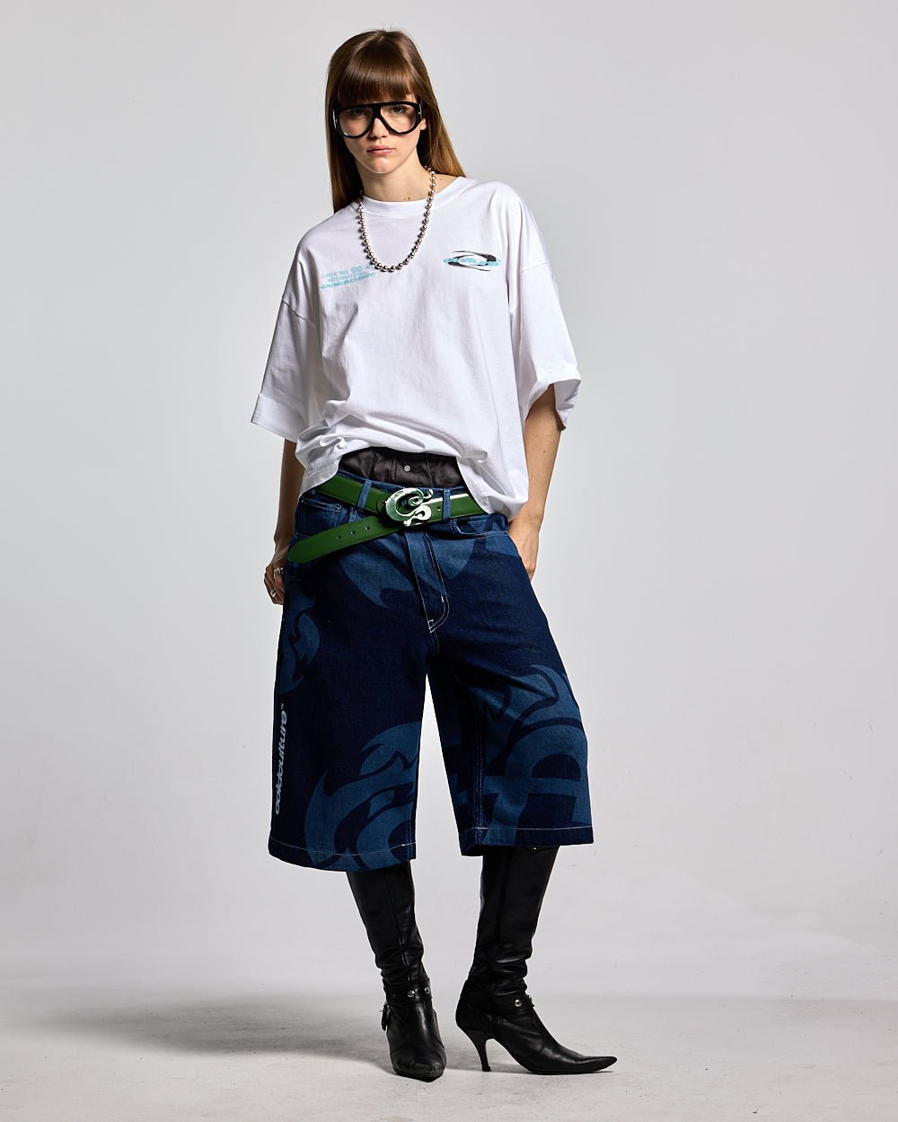 LASER DENIM BLUE JORTS - blue graphic print denim shorts, front view on female model - Cold Culture #woman