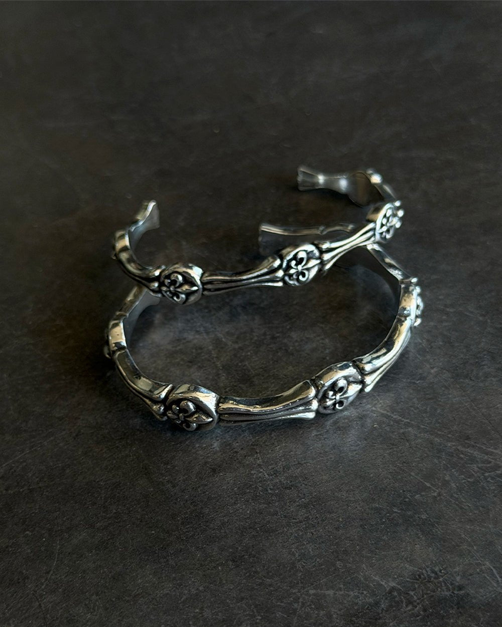 LIL ICON BRACELET SILVER - silver engraved cuff bracelet, flat lay - Cold Culture