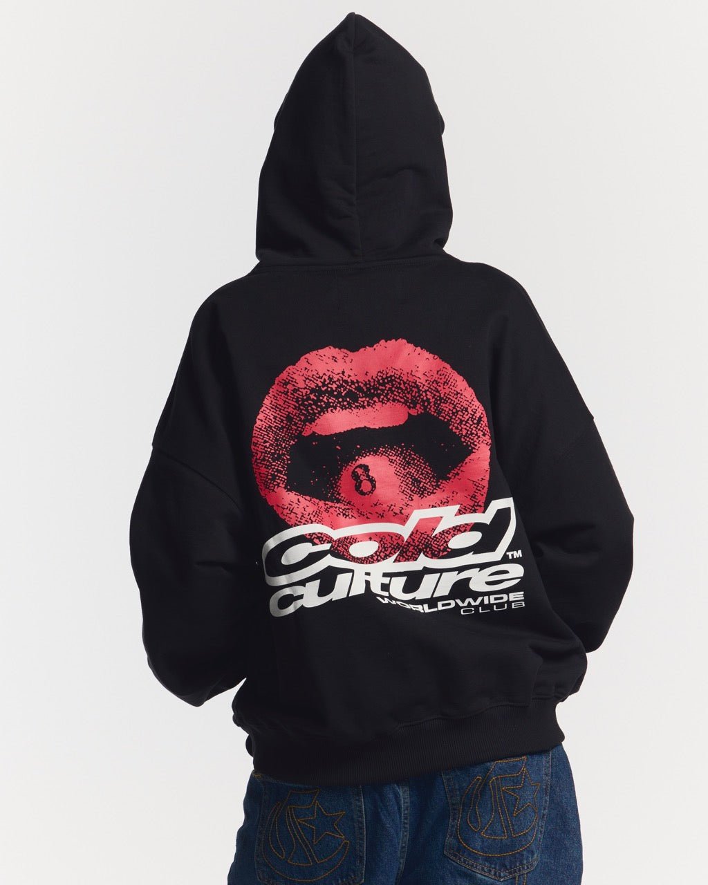 LIP COMBO HOODIE BLACK - black hoodie with lips graphic, back view on female model - Cold Culture #woman