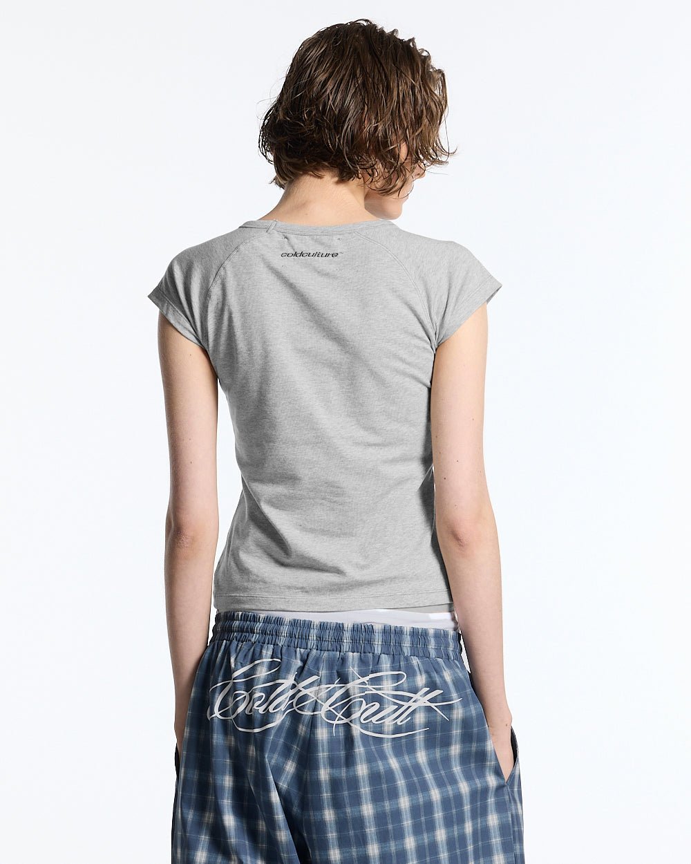 LITTLE BABY TEE HEATHER GREY - heather grey graphic baby tee, back view on female model - Cold Culture #woman