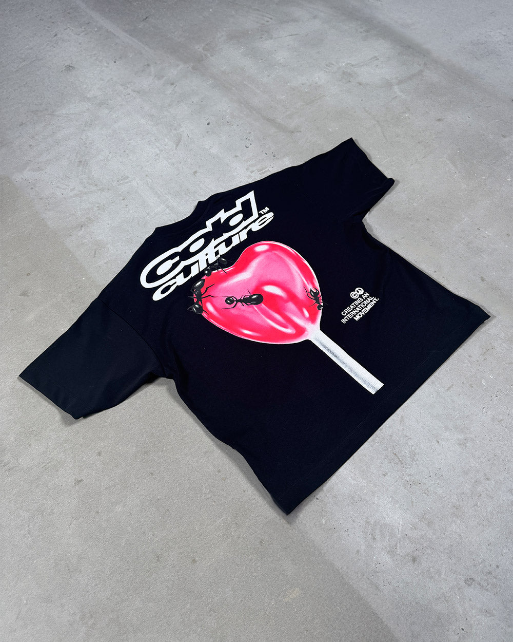 LOLLIPOP TEE BLACK - black graphic print tee, flat lay - Cold Culture