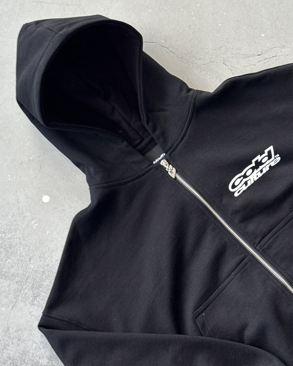 LOLLIPOP ZIP HOODIE BLACK - black graphic print zip-up hoodie, detail close-up - Cold Culture