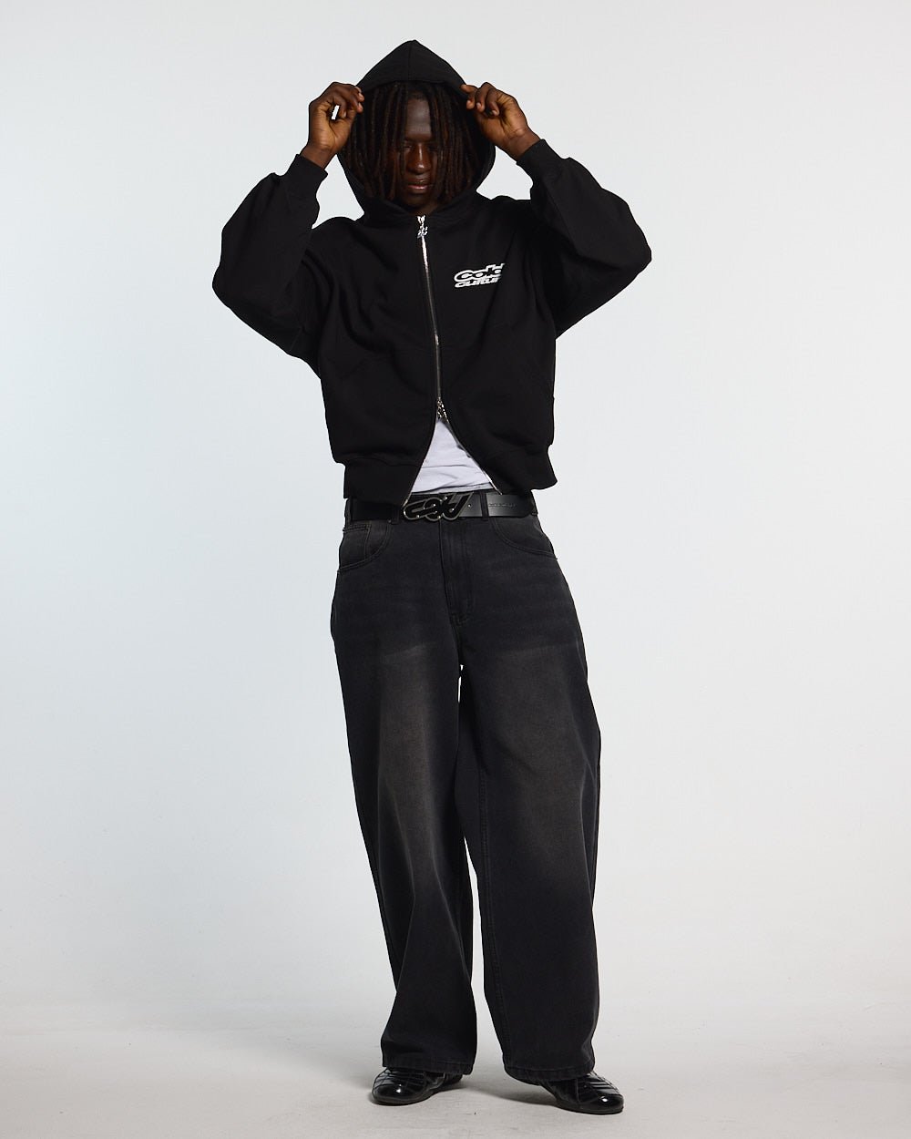 LOLLIPOP ZIP HOODIE BLACK - black graphic print zip-up hoodie, front view on male model - Cold Culture #man