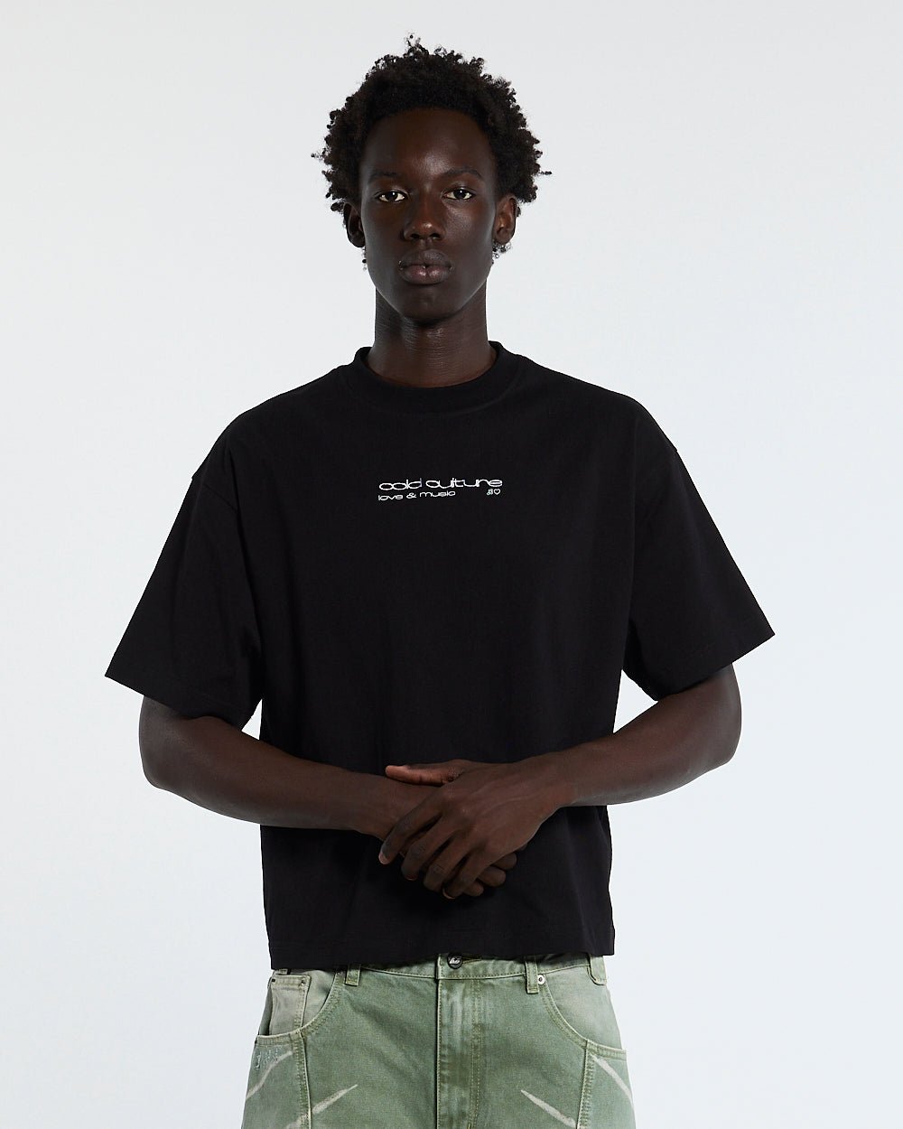 LOVEPODS TEE BLACK - black graphic print tee, front view on male model - Cold Culture #man