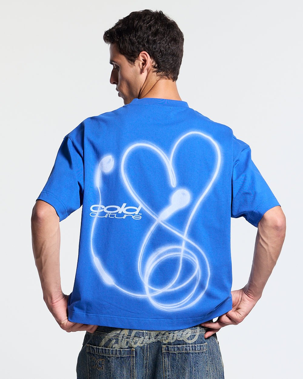 LOVEPODS TEE BLUE - blue graphic print tee, back view on male model - Cold Culture #man