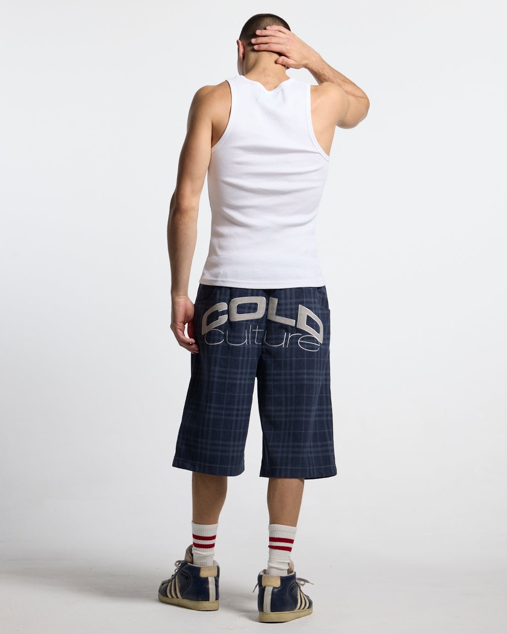 LOW KEY BASIC TANK TOP 2 PACK WHITE & BLACK - black and white ribbed tank tops, back view on male model - Cold Culture #man