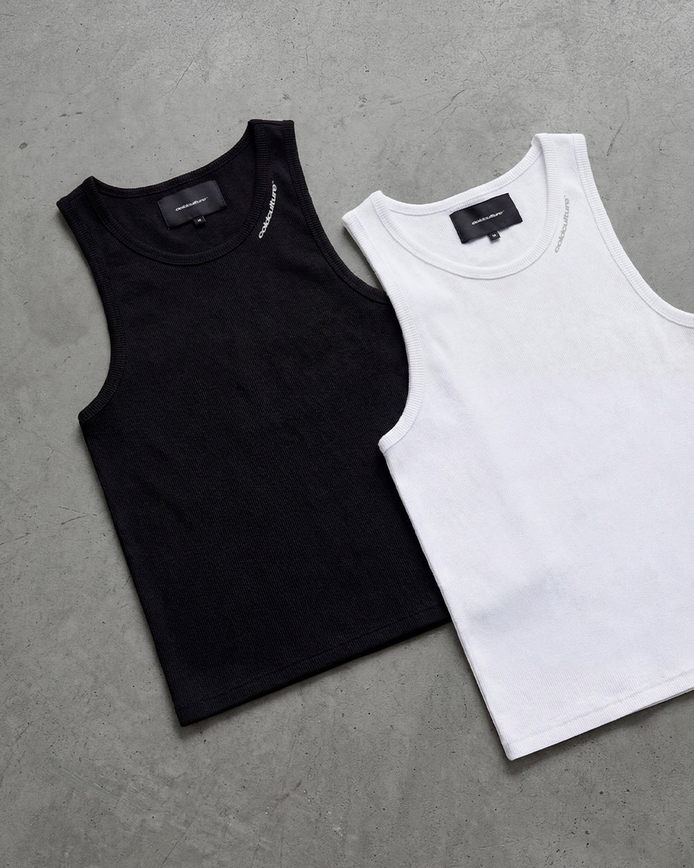 LOW KEY BASIC TANK TOP 2 PACK WHITE & BLACK - black and white ribbed tank tops, flat lay with matching pieces - Cold Culture