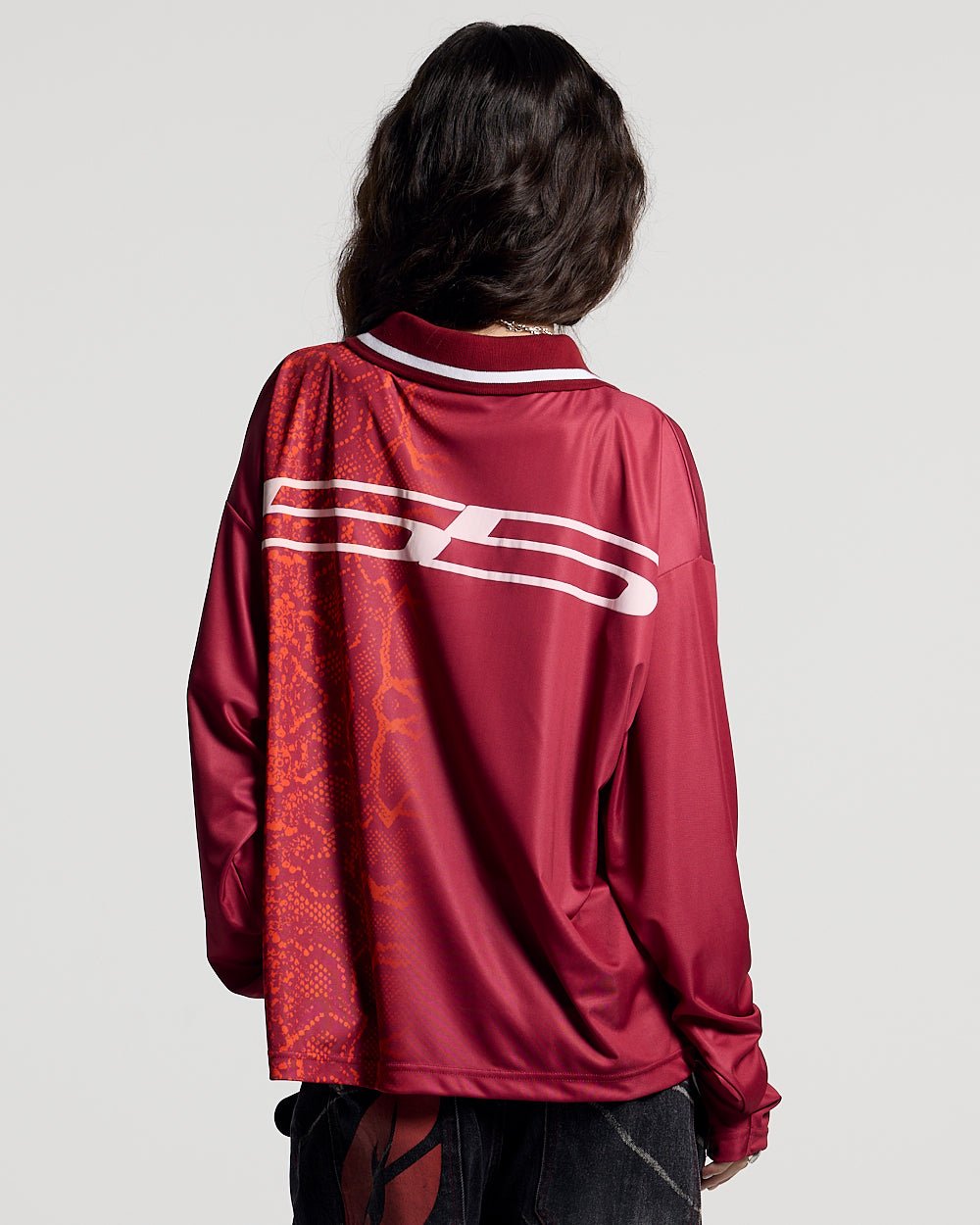 MAMBA SNAKE LONGSLEEVE POLO RED - red snake print longsleeve polo, back view on female model - Cold Culture #woman