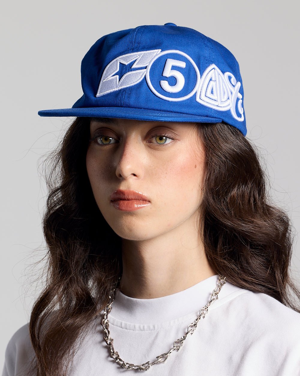 MEETING CAP DARK BLUE - royal blue embroidered cap, on model close-up - Cold Culture #woman