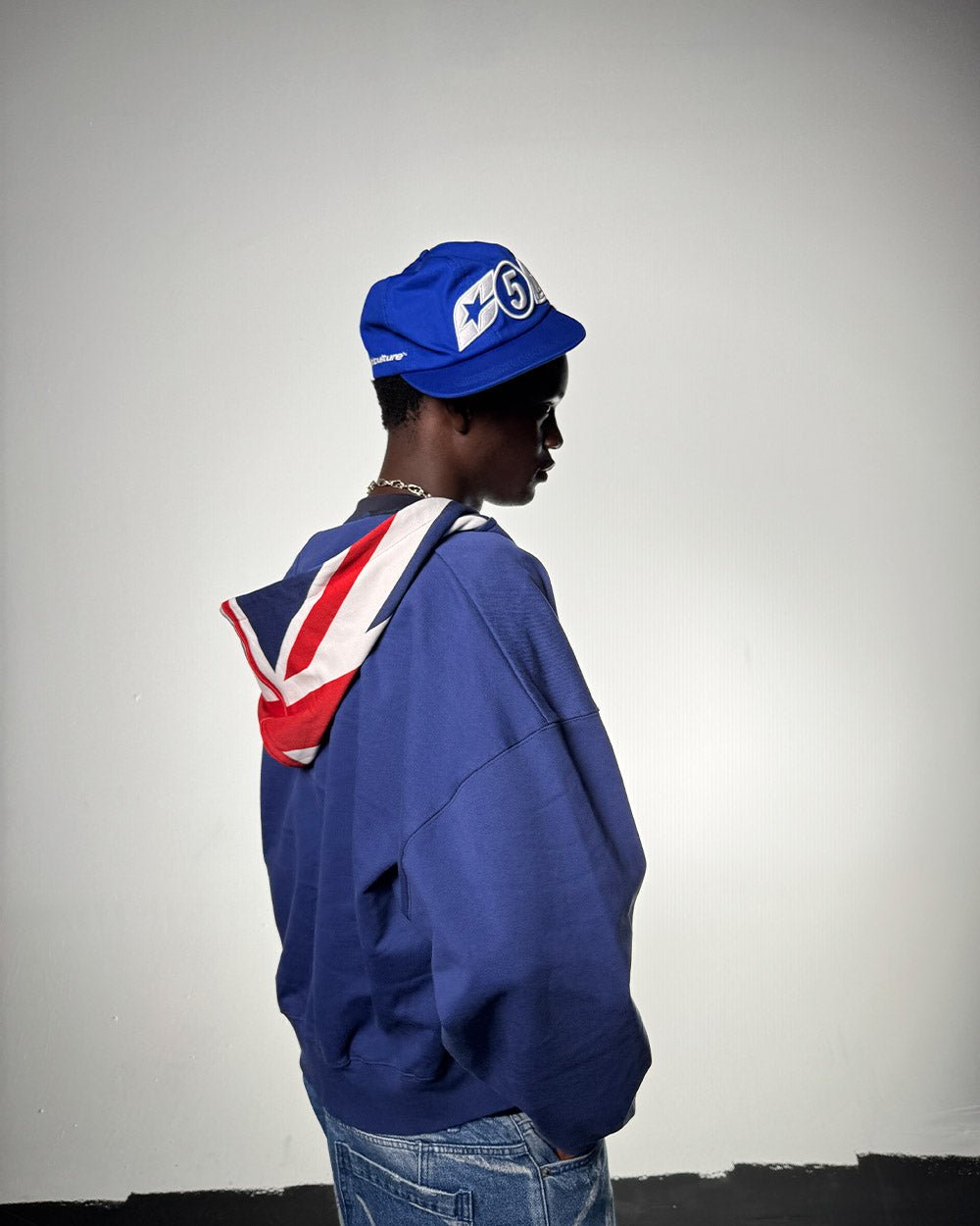MEETING CAP DARK BLUE - royal blue embroidered cap, street style shot - Cold Culture