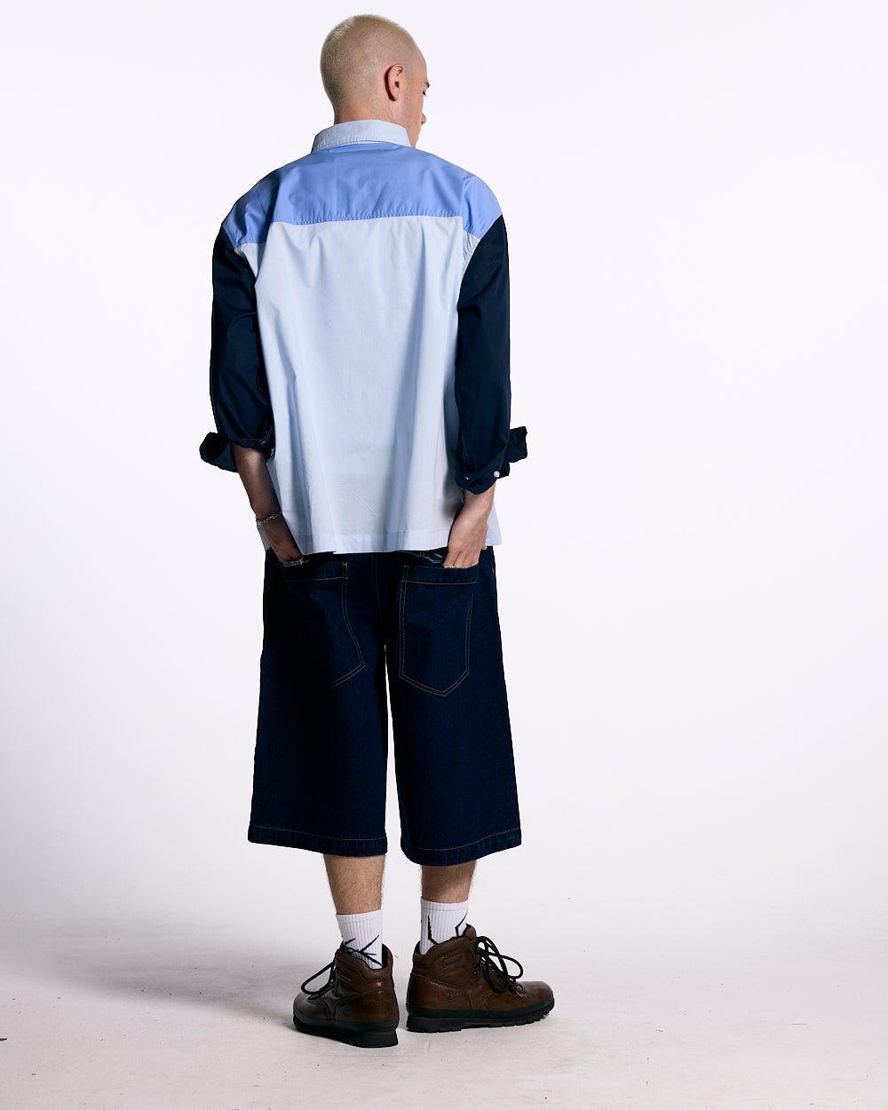 MOTO SHIRT - blue colorblock long sleeve shirt, back view on male model - Cold Culture #man