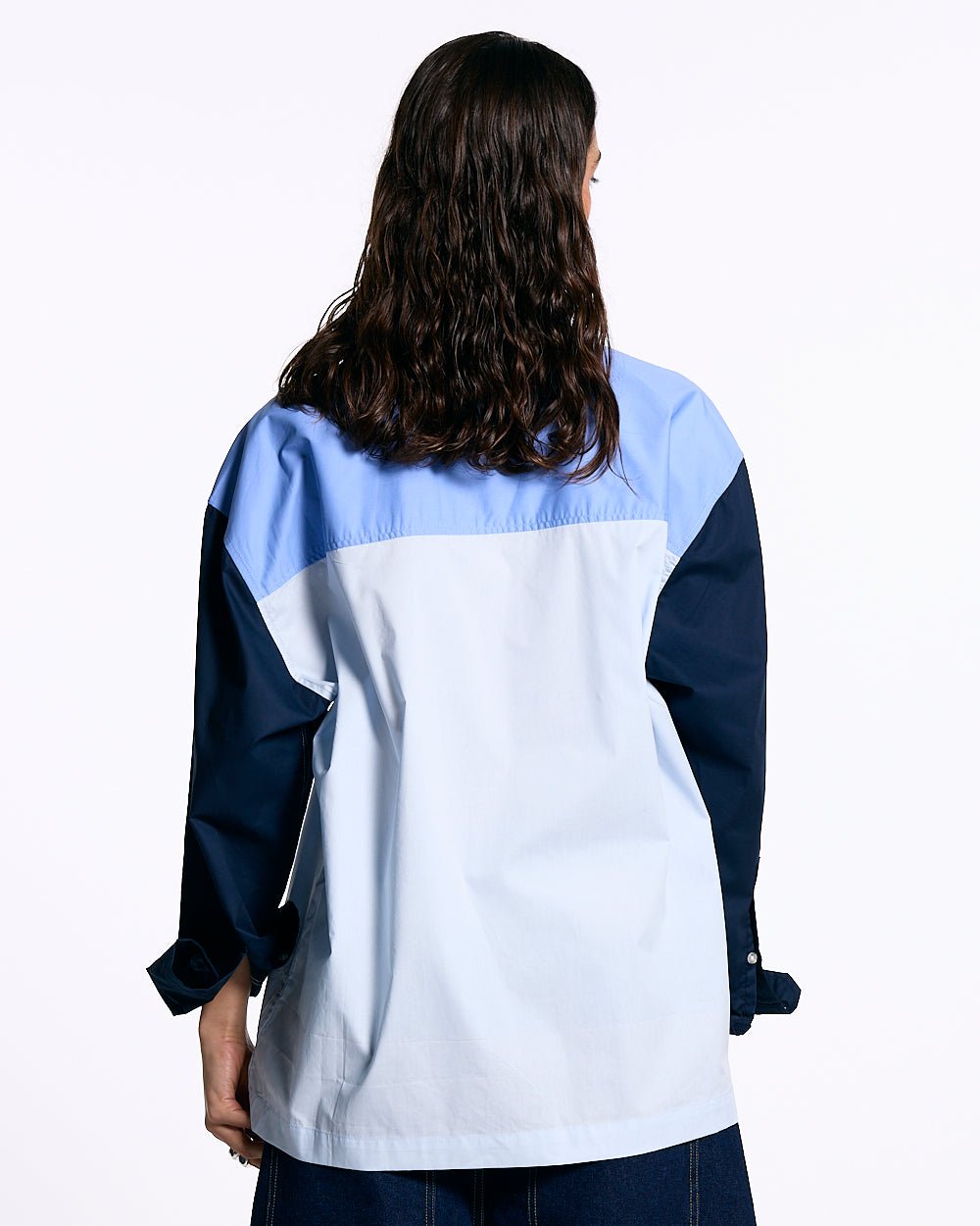 MOTO SHIRT - blue colorblock long sleeve shirt, back view on female model - Cold Culture #woman