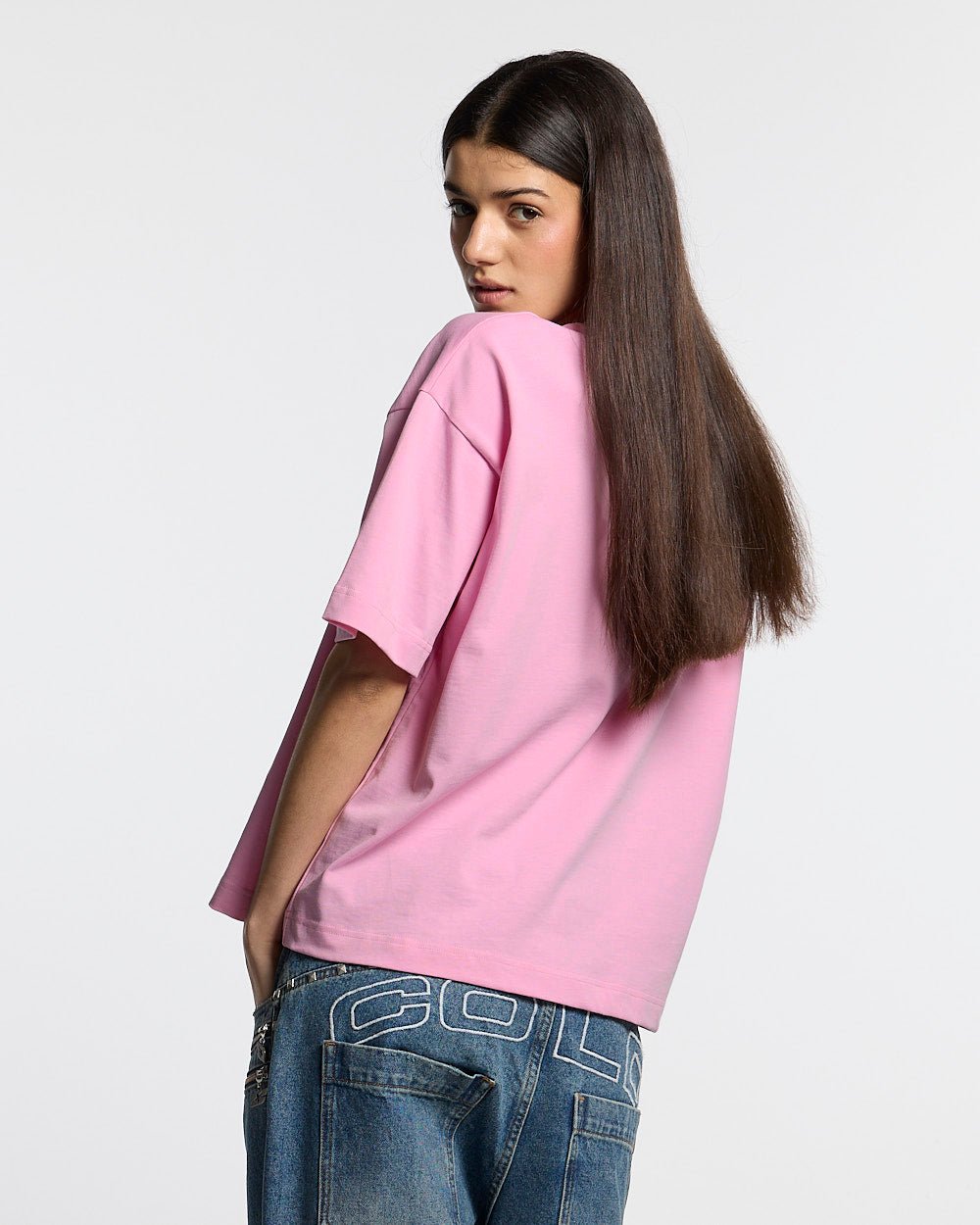 MR WORLDWIDE TEE PINK - pink graphic print tee, back view on female model - Cold Culture #woman