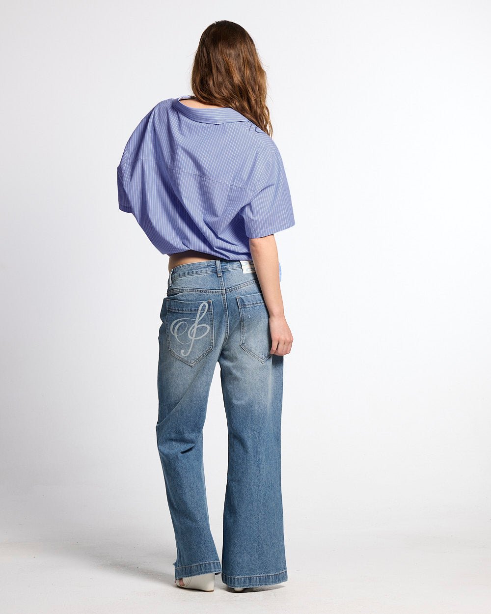 MZRT V3 PANTS LIGHT BLUE - light blue printed denim pants, back view on female model - Cold Culture #woman