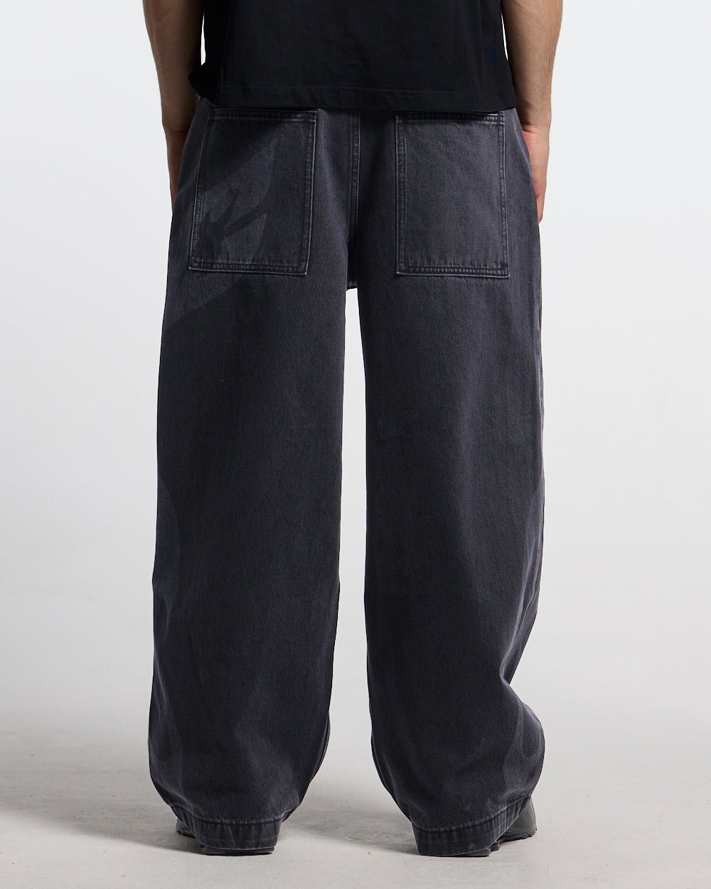 NEOTRIBAL V2 PANTS WASHED BLACK - washed black tribal print pants, back view on male model - Cold Culture