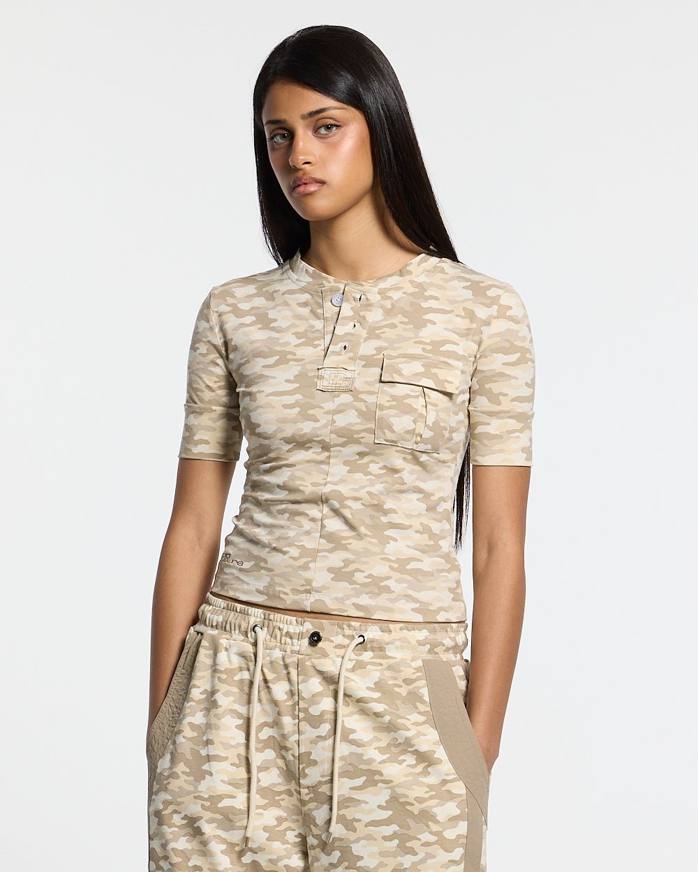 NEUTRAL FIELD BABY TEE CAMO - beige camo baby tee, front view on female model - Cold Culture #woman
