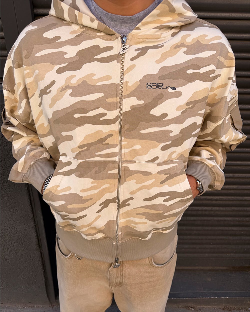 NEUTRAL FIELD ZIP HOODIE CAMO - beige camo zip-up hoodie, on model close-up - Cold Culture