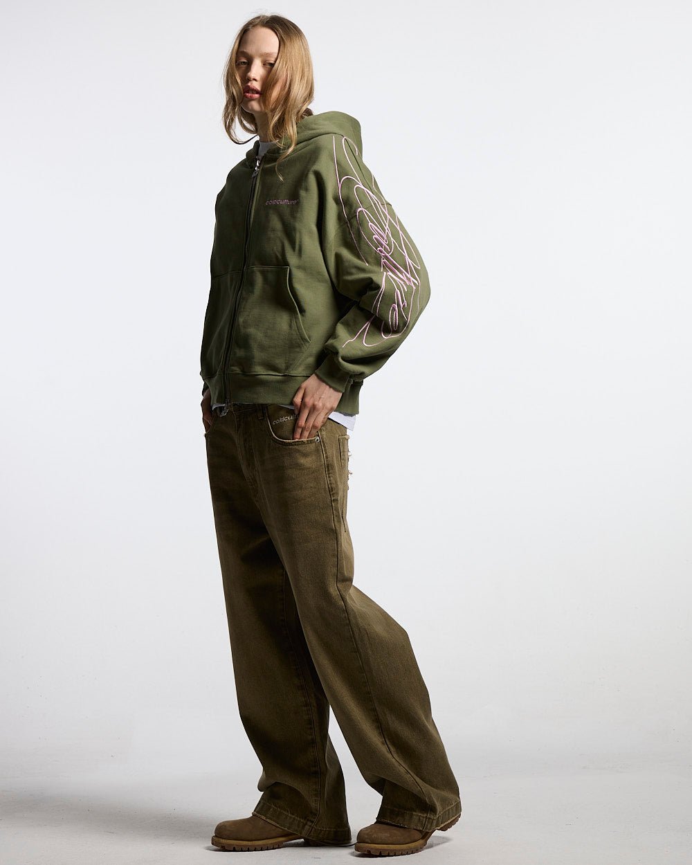NEW SCRIPT ZIP HOODIE GREEN & PINK - olive green zip-up hoodie, side view - Cold Culture #woman