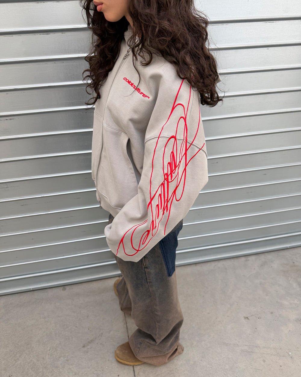 NEW SCRIPT ZIP HOODIE GREY & RED - grey zip-up hoodie, street style shot - Cold Culture #woman
