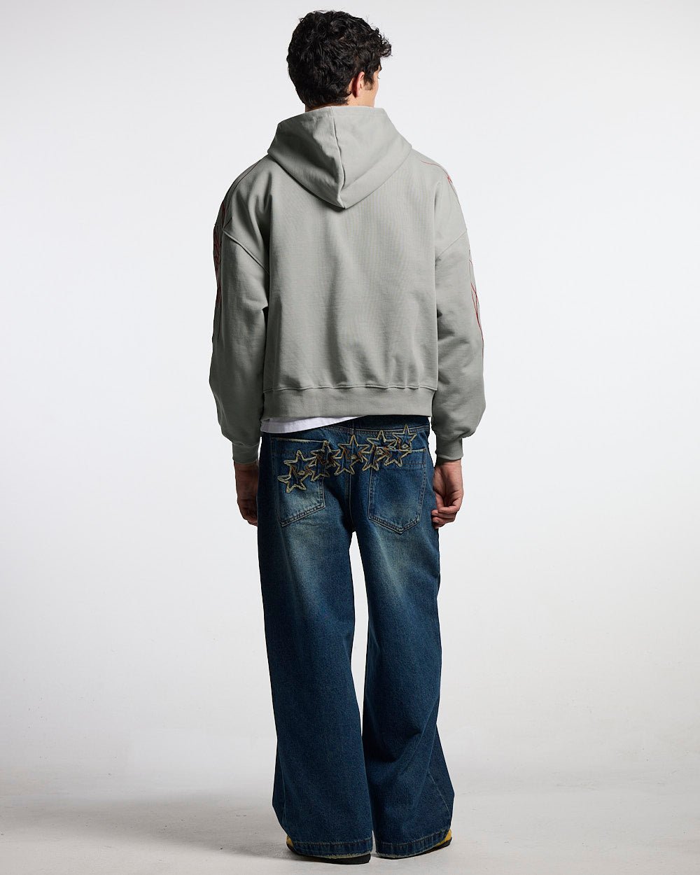 NEW SCRIPT ZIP HOODIE GREY & RED - grey zip-up hoodie, back view on male model - Cold Culture